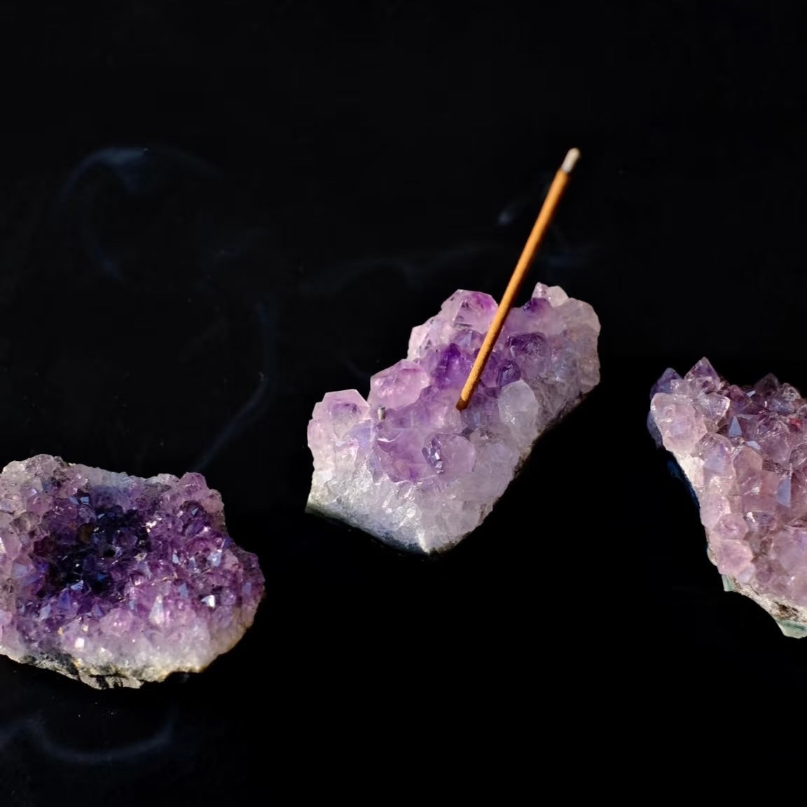 A beautiful combination of a purple amethyst crystal and natural incense, designed to bring tranquility, balance, and positive energy into your space.