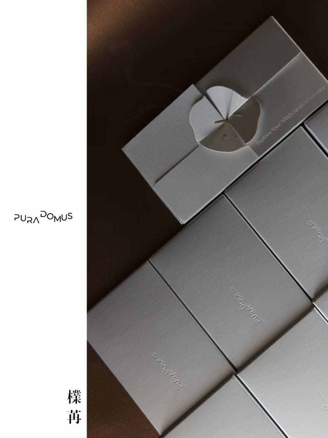 Silver eco-friendly paper packaging with a petal-shaped paper design that doubles as an incense holder.